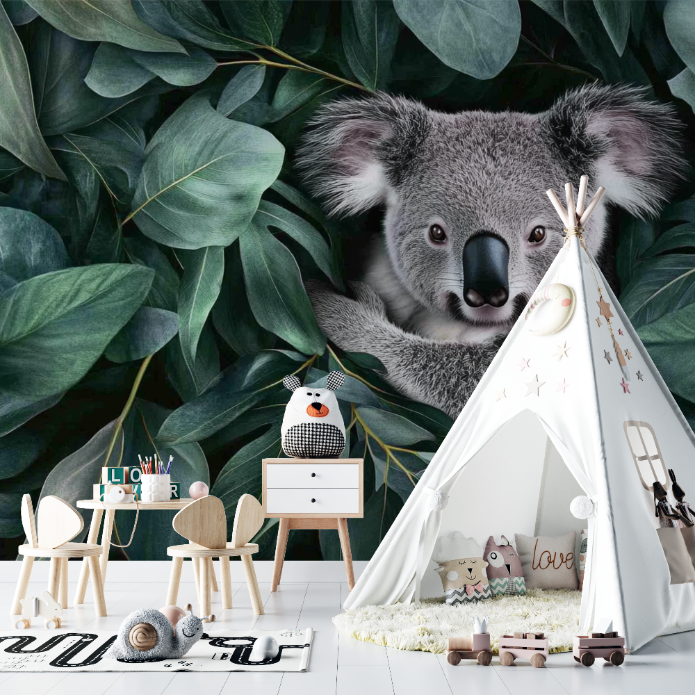 Papier peint koala dans un cocon de feuilles chambre bebe